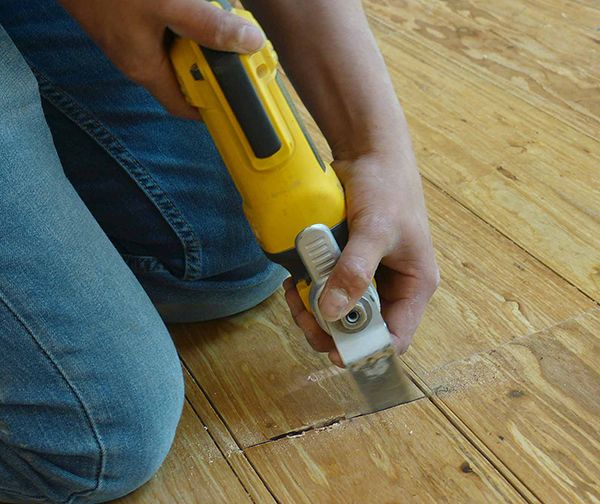 Use Multi Tool To Finish Cutting Through Plank