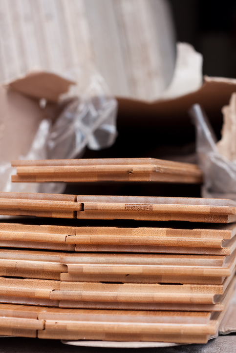 "Stacked bamboo wood floor, coming out of the box."