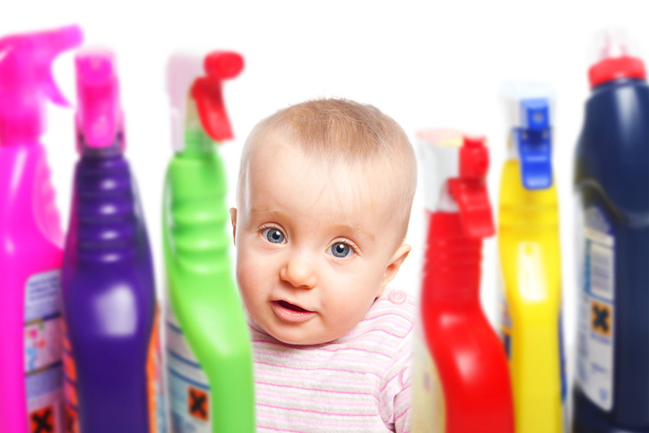 Little child wants to play with chemical cleaning products