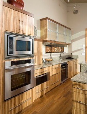 Modern kitchen with bamboo cabinets and granite counter tops