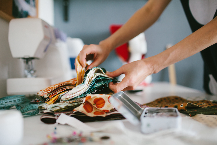 DIY seamstress using upcycled fabric for eco-friendly projects