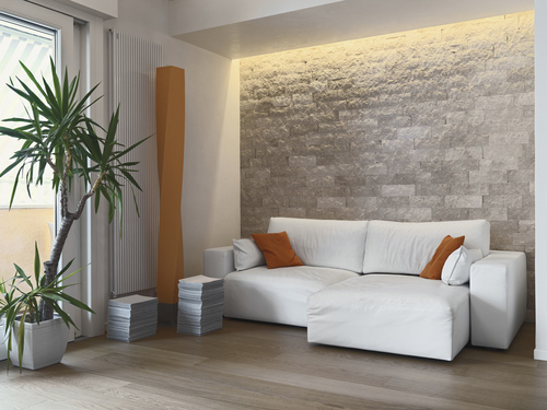 interior view of a modern living room with fabric sofa and wood floor