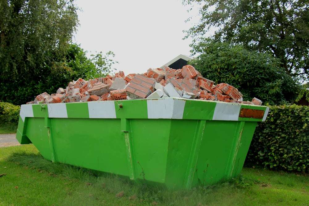 Loaded Dumpster Home Renovation reduce waste