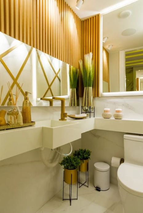 A sustainable bathroom design that uses reclaimed wood and live plants to enhance an eco-friendly design.