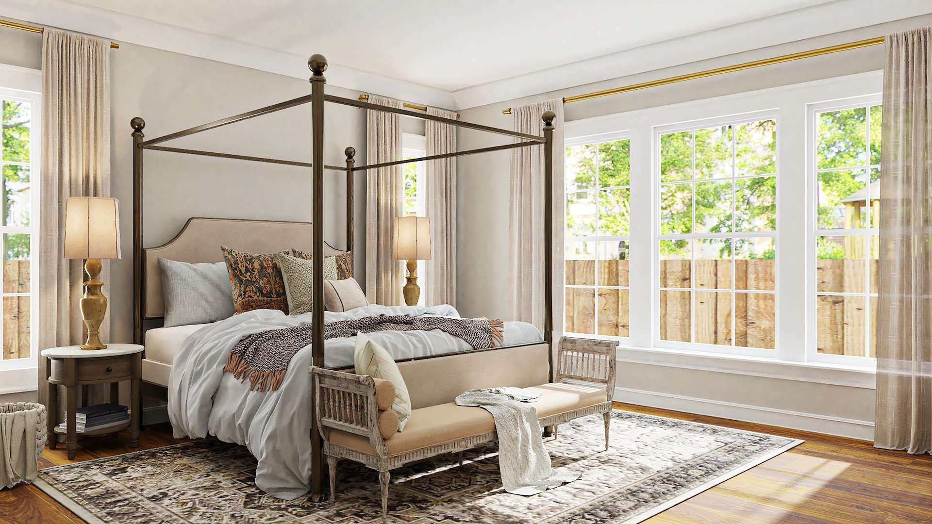 This guest room design uses white and tan colors in the poster bed’s bedding and the rug to create a warmer atmosphere.