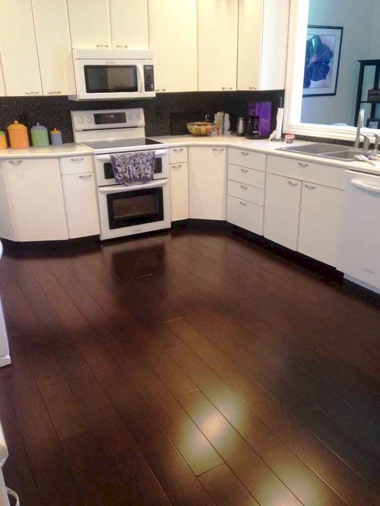 dark-flooring-contrasted-kitchen-cabinets