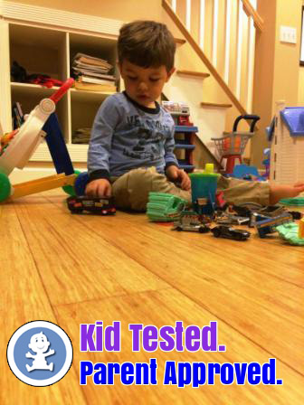 Child playing with toys on strand woven bamboo flooring